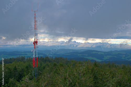 View from the lookout tower Breitenstein in Kirchschlag towards the sent-towers during storms and rain