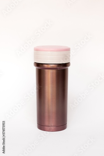 Pink thermos travel tumbler isolated on white background.