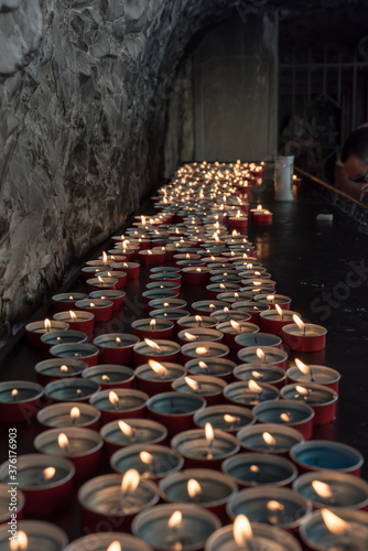 Fototapeta Naklejka Na Ścianę i Meble -  Candles lit in the church