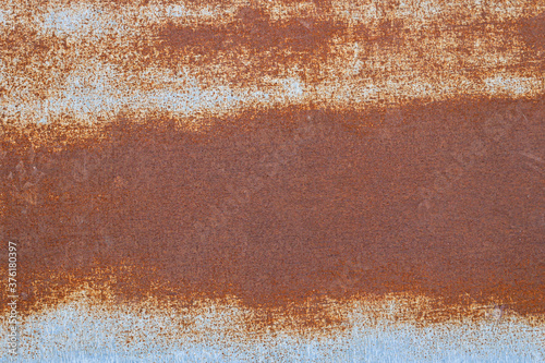 rusty surface of old roof metal sheet © taviphoto