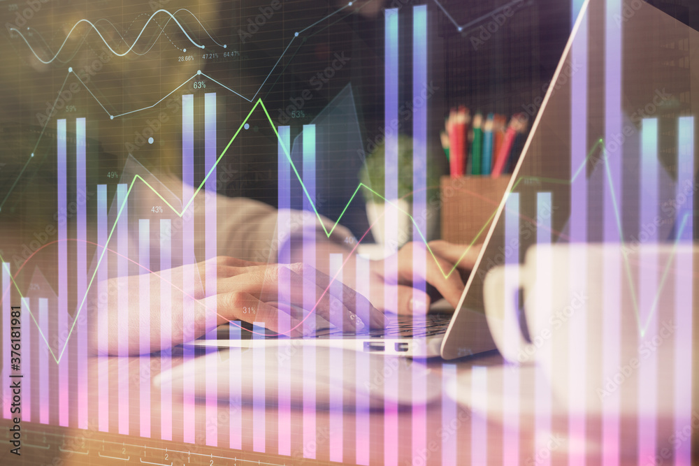 Double exposure of woman hands typing on computer and forex chart hologram drawing. Stock market invest concept.