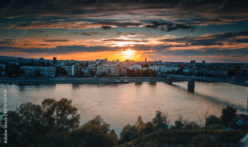 View of the city of Novi Sad and the Danube river at sunset from the Petrovaradin fortress.