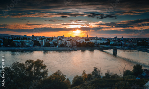 View of the city of Novi Sad and the Danube river at sunset from the Petrovaradin fortress.