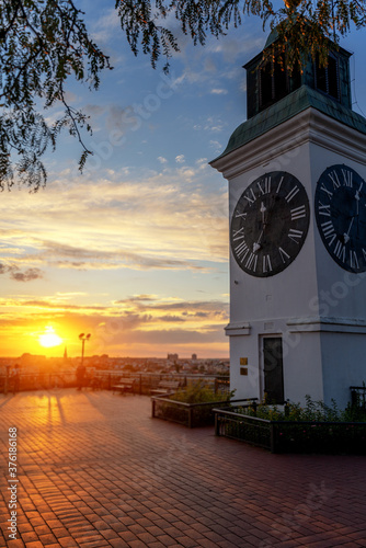 Clock tower in the Petrovaradin fortress at sunset, travel Balkan countries photo