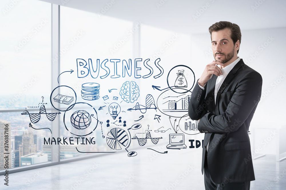 Thoughtful businessman and his business plan Thoughtful businessman and his business plan