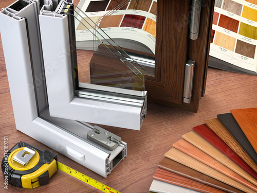 Slika na platnu Cross section  of plastic PVC window and catalogue swith watches in office