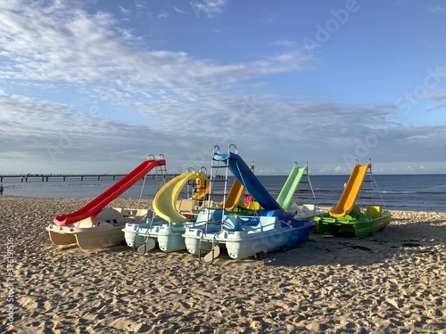 Plastic pedal boats on sandy beach or Usedom, Mecklenburg Vorpommern, Germany, Europe 