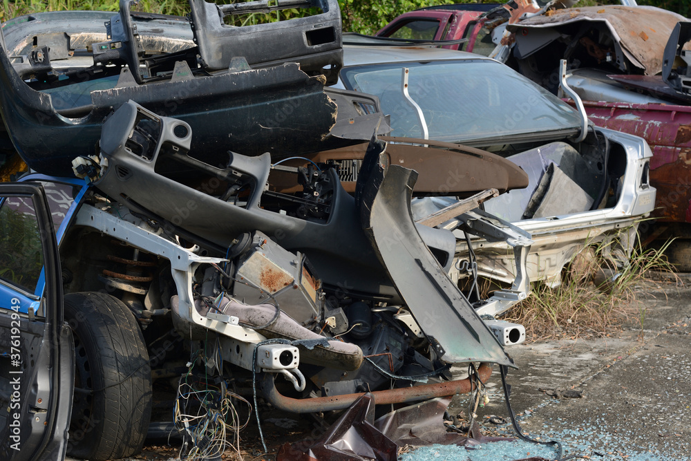 Chiang Mai, Thailand - September 5, 2020. Dirty and wreck cars at the car cemetery. Chiang Mai, Thailand - September 5, 2020. Dirty and wreck cars at the car cemetery.