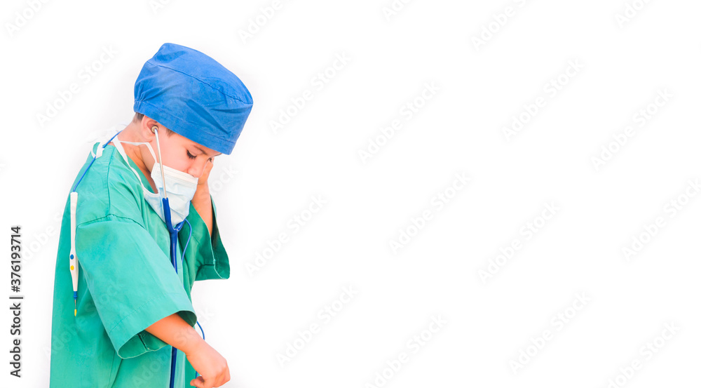 child dressed as a doctor. doctor-surgeon costume. child dressed as a doctor. doctor-surgeon costume.