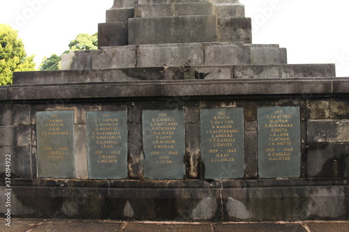 Upholland, Lancashire, UK, 06/09/2020: Five polished slate tablets inscribed with the gilded names of those fallen in the First World War and the Second World War photo