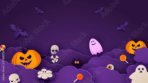 Happy Halloween banner or party invitation background with night clouds and pumpkins in paper cut style. Vector