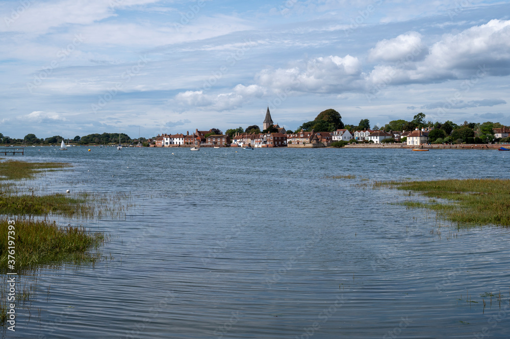 Bosham Village views from across the estuary on a warm and sunny summer day.
