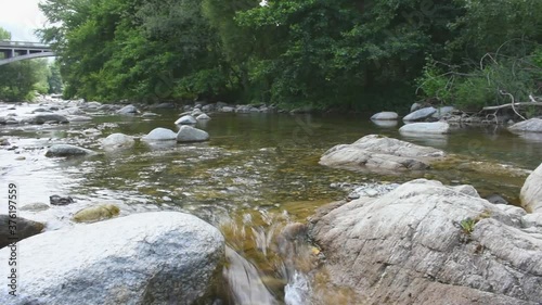 Water flowing between the rocks of a river