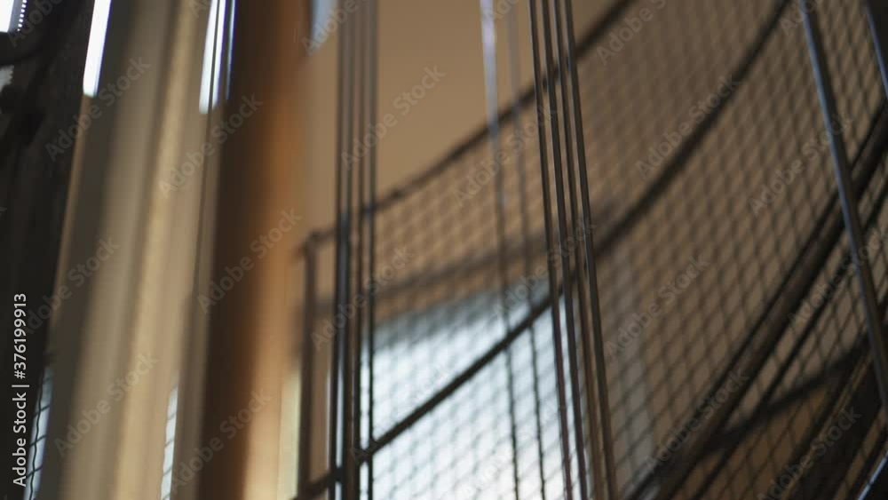 Macro Shot Of Lifting Cables Rising Inside A Building - close up