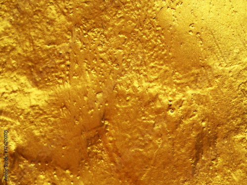 Abstract gold background with texture.
