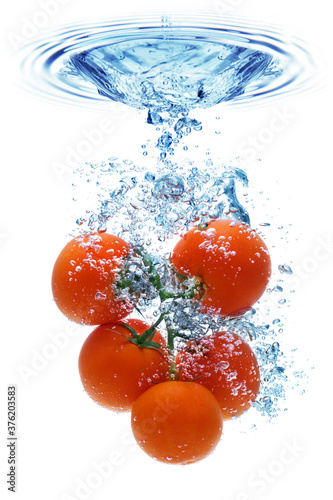 Tomato splashing in water