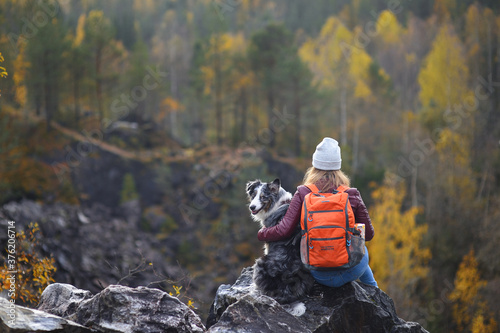 Photography the girl and dog relax