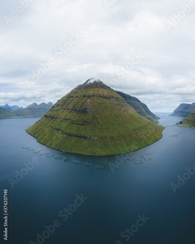 Faroe islands aerial drone view of mountain landscape of Kunoy, view from Klaksvik in the north atlantic ocean photo