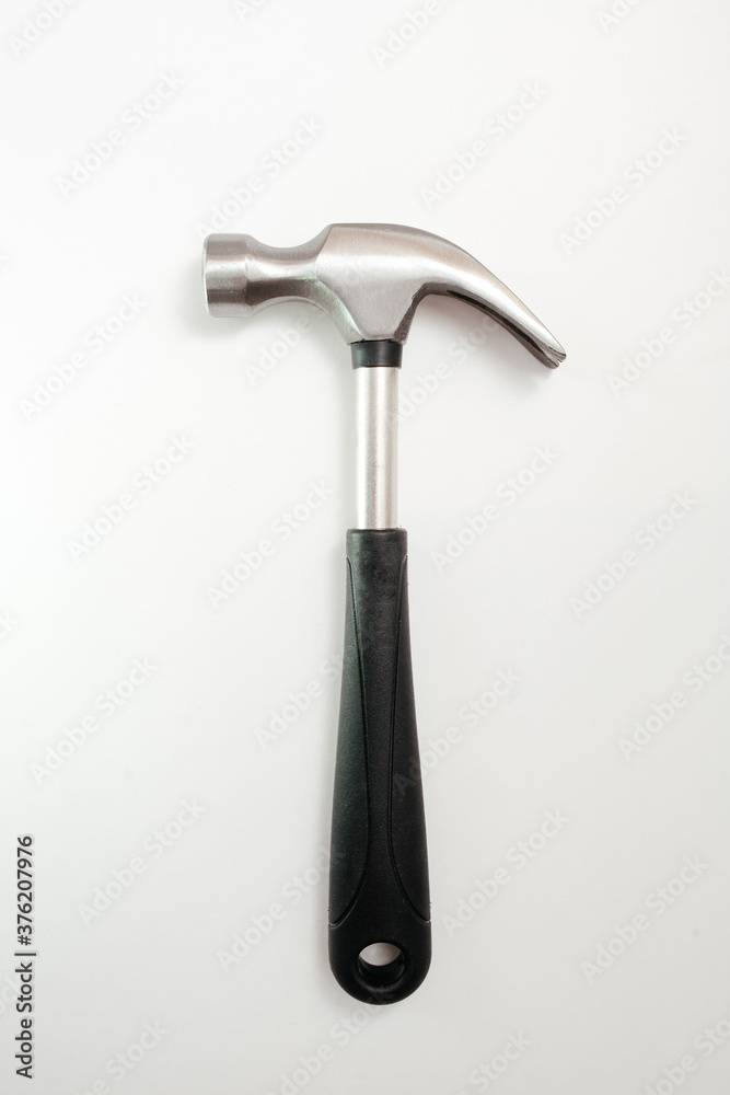 hammer on a white background. View from above. Home repair and mending. Isolated object hammer on a white background. View from above. Home repair and mending. Isolated object