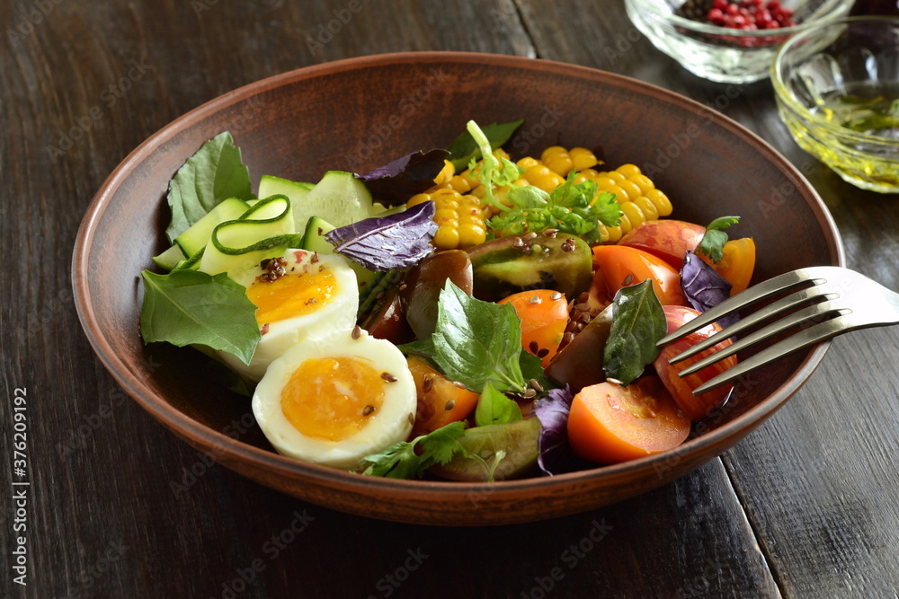 Corn salad with vegetables and boiled egg
