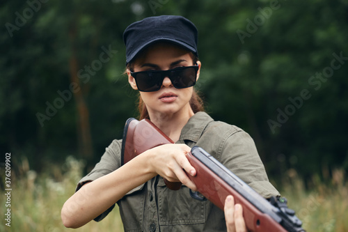 Woman Sunglasses shotgun hunting lifestyle black cap 