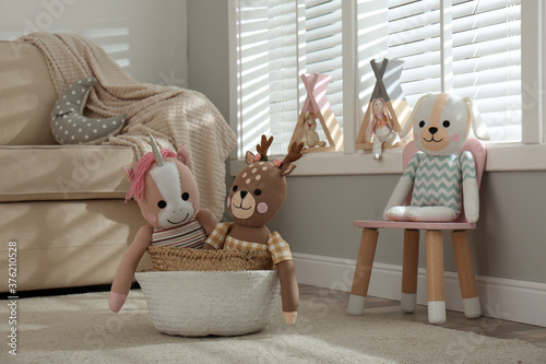 Funny toy unicorn  dog and deer in children s room.  Interior design