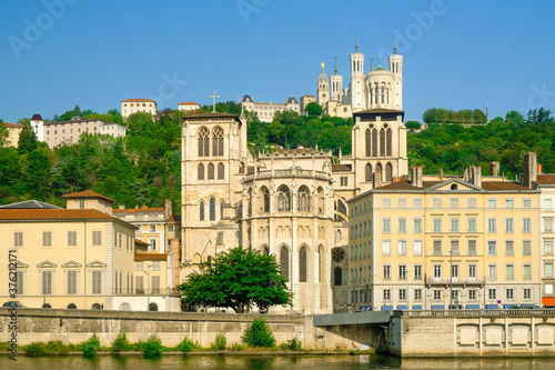 View of the Saone river embankment with Lyon Cathedral of Saint Jean Baptiste, Lyon, France