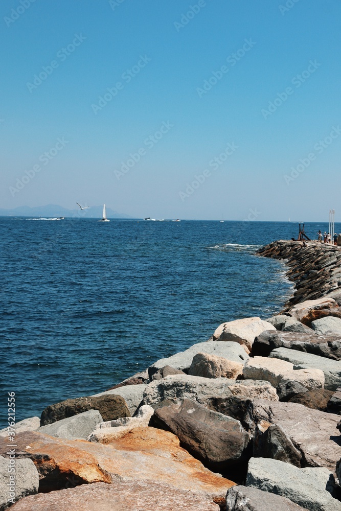 Rocks in the sea of Saint-Tropez in France, Harbor view