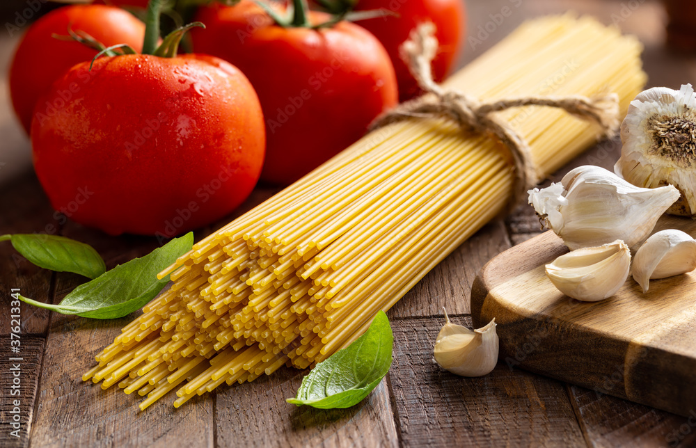 Raw Spaghetti Pasta Tied in a Bundle Raw Spaghetti Pasta Tied in a Bundle