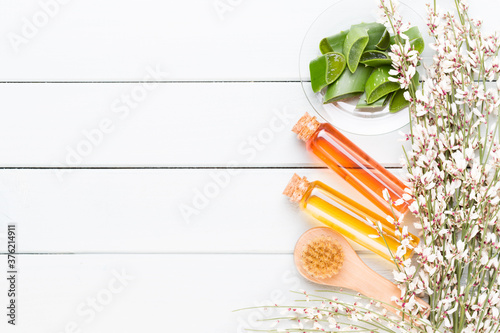 Beauty and fashion concept with spa set on pastel rustic wooden background.