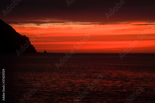 scarlet dawn rises over the sea © Елена Кондратюк