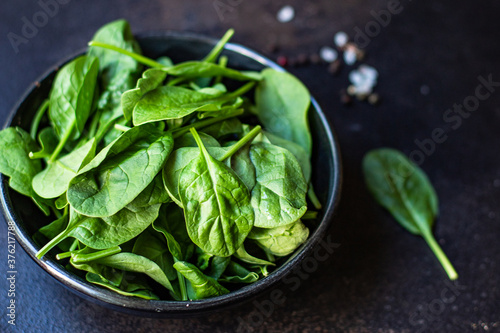 spinach green juicy leaves organic salad serving size natural top view copy space  for text diet raw