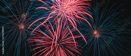 real colorful fireworks in the night sky, colorful fireworks on black background