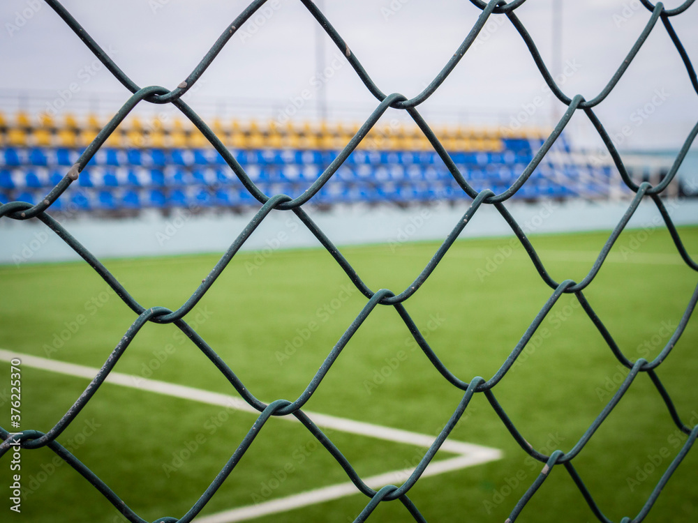 View of the playground through the fence