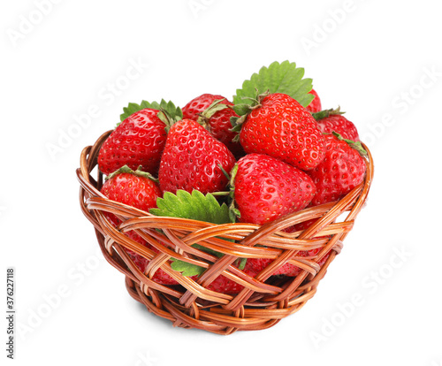 Fresh ripe red strawberries in wicker basket isolated on white