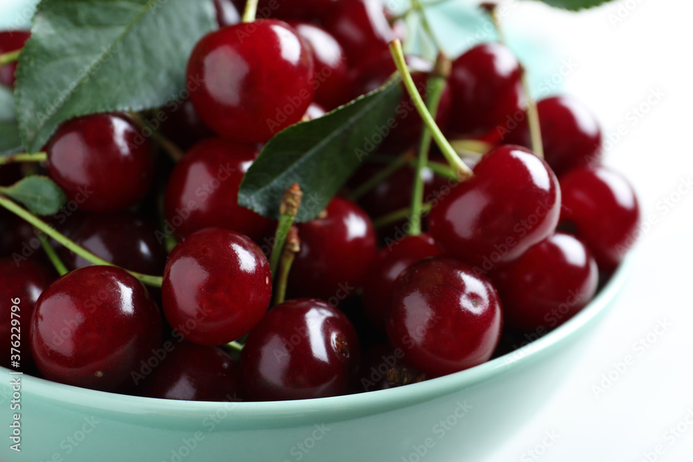 Sweet ripe juicy cherries in bowl, closeup Sweet ripe juicy cherries in bowl, closeup