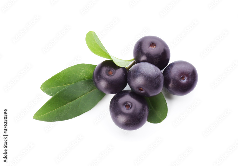 Pile of fresh acai berries with leaves isolated on white, top view Pile of fresh acai berries with leaves isolated on white, top view