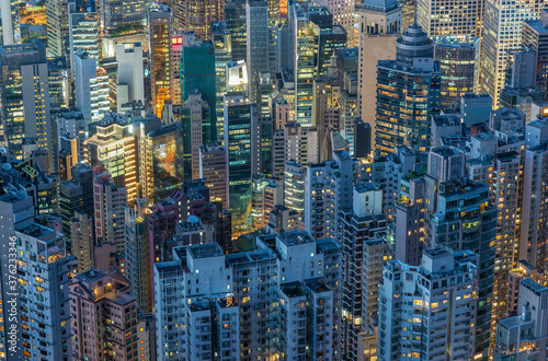 Aerial view of crowded high rise building in Hong Kong city at night