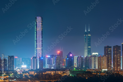 Skyline of Shenzhen City  China at twilight. Viewed from Hong Kong border