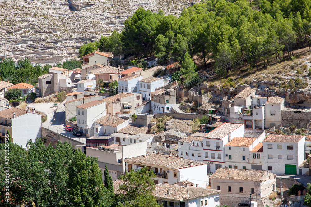 Obraz premium Old houses in Alcala del Jucar, Albacete, a picturesque and beatiful village in Spain. Castile-La Mancha
