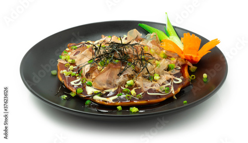 Okonomiyaki ontop Kutsuobushi & spring onion savory version of Japanese pancake