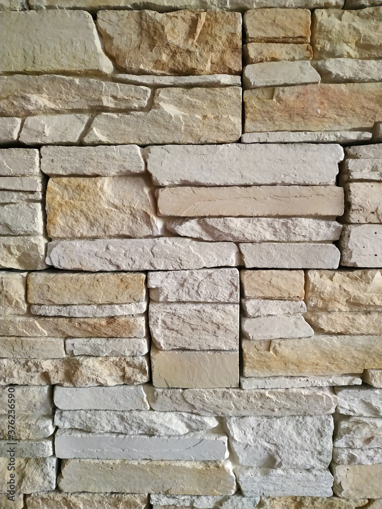 Vertical pattern of decorative modern stone wall texture Vertical pattern of decorative modern stone wall texture