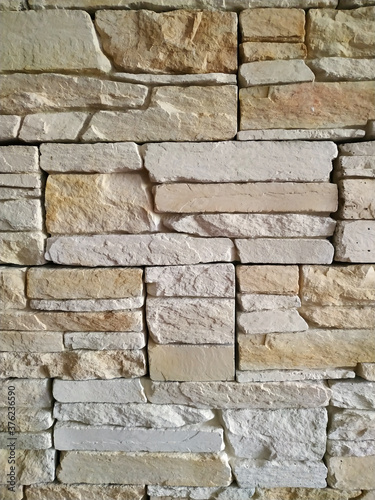 Vertical pattern of decorative modern stone wall texture