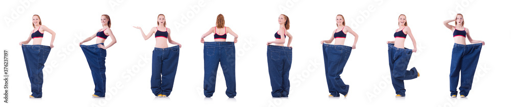 Woman with large jeans in dieting concept Woman with large jeans in dieting concept