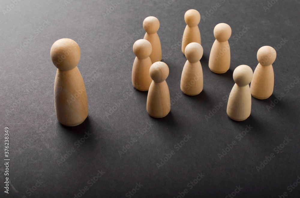Business & HR global wood puzzle concept for leadership and team with peg doll. Selective focus. Business & HR global wood puzzle concept for leadership and team with peg doll. Selective focus.