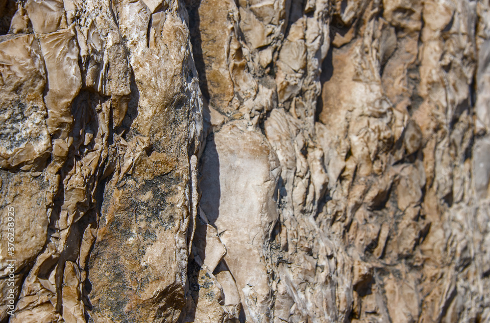 Ancient wall folded of natural rough stones, perspective view. Ancient wall folded of natural rough stones, perspective view.