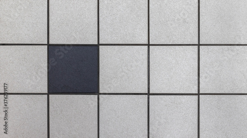 Wallpaper Mural One black tile among many grays. Individuality Concept illustration. Torontodigital.ca