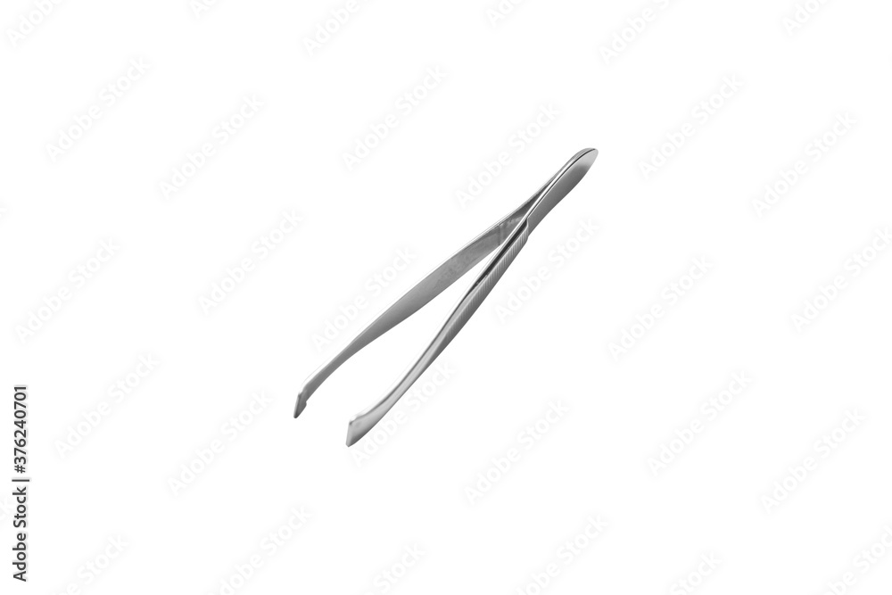 Metal tweezers isolated on a white background. Metal tweezers isolated on a white background.