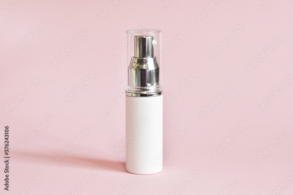 White cosmetic products tube. Blank plastic container for cream, lotion, toothpaste, nourishing or moisturizing mask on a pink background. Eco-friendly, organic cosmetology concept. Copy space. White cosmetic products tube. Blank plastic container for cream, lotion, toothpaste, nourishing or moisturizing mask on a pink background. Eco-friendly, organic cosmetology concept. Copy space.