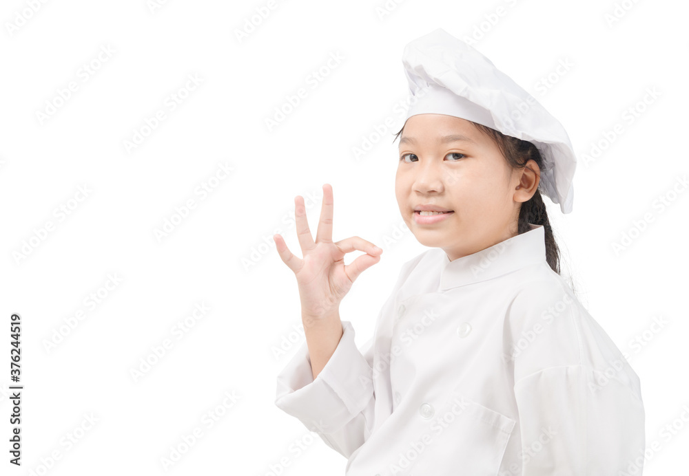 Happy asian girl chef in uniform showing OK sign isolated Happy asian girl chef in uniform showing OK sign isolated